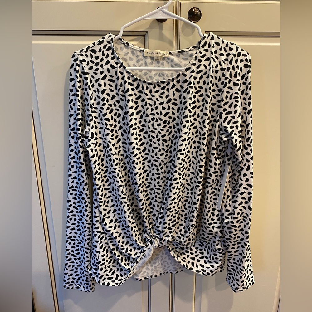 Above & Beyond ladies top